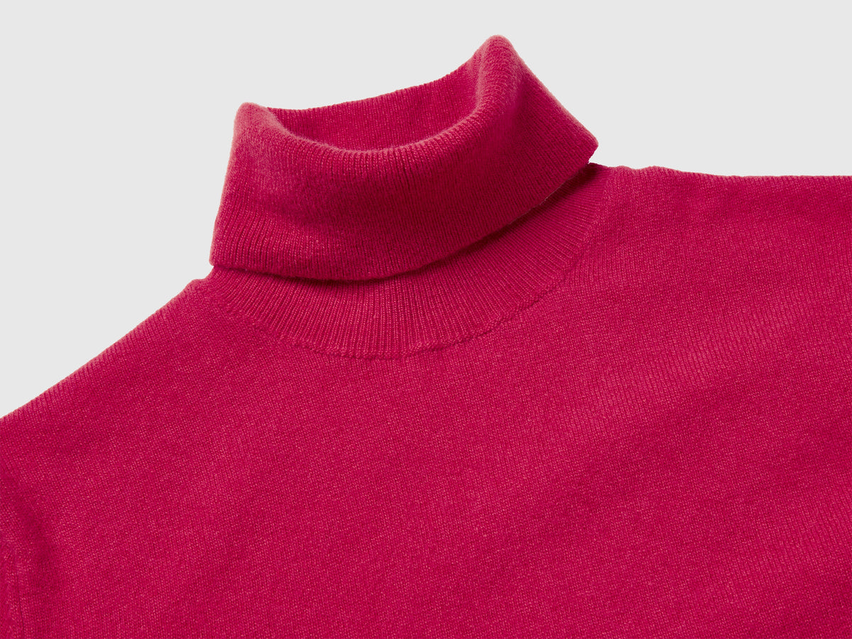 Maglione dolcevita fucsia in pura lana Merino