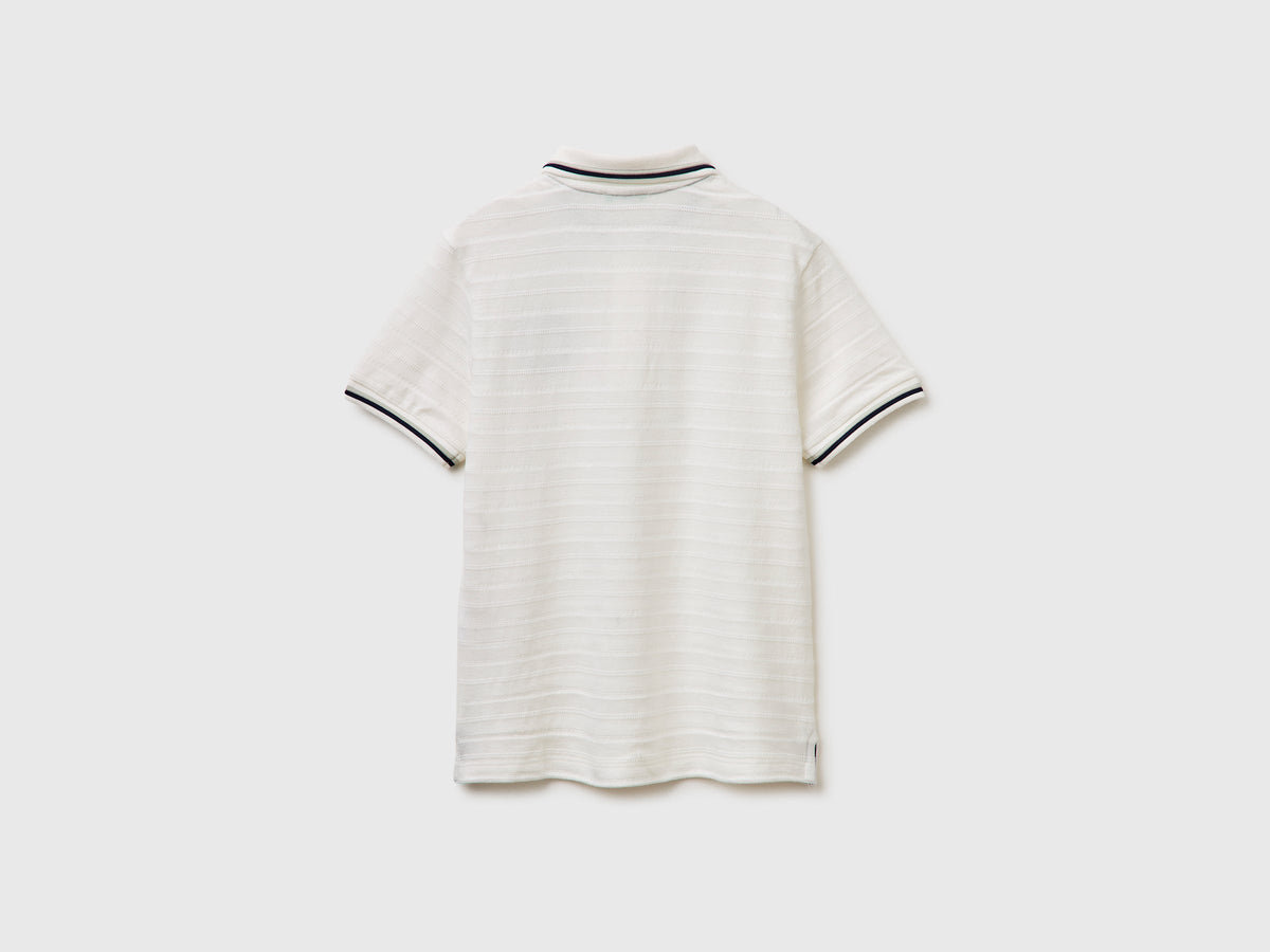 Polo a righe con patch