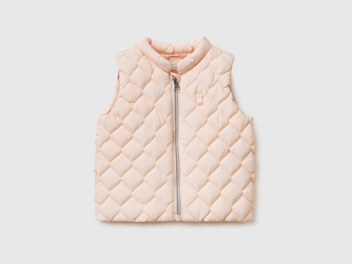 Piumino smanicato con zip