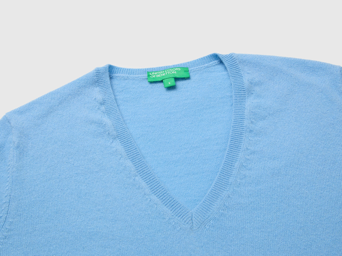 Maglia scollo a V azzurra in pura lana Merino