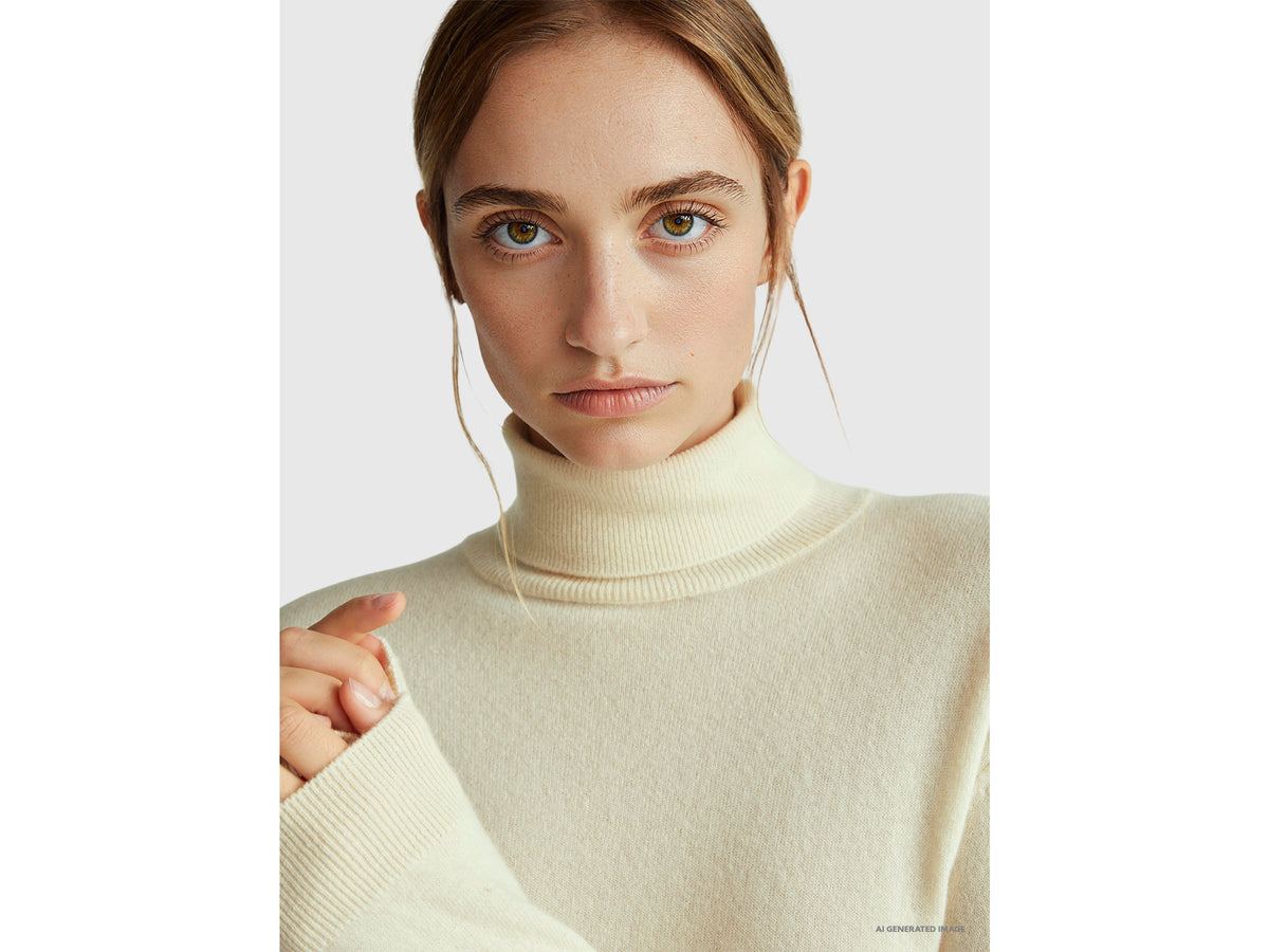 Maglione dolcevita panna in pura lana Merino