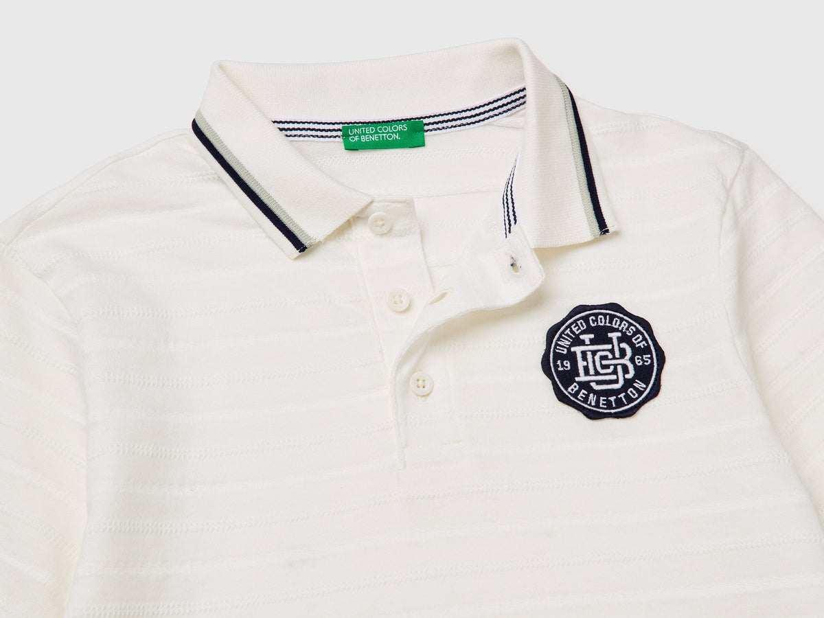Polo a righe con patch