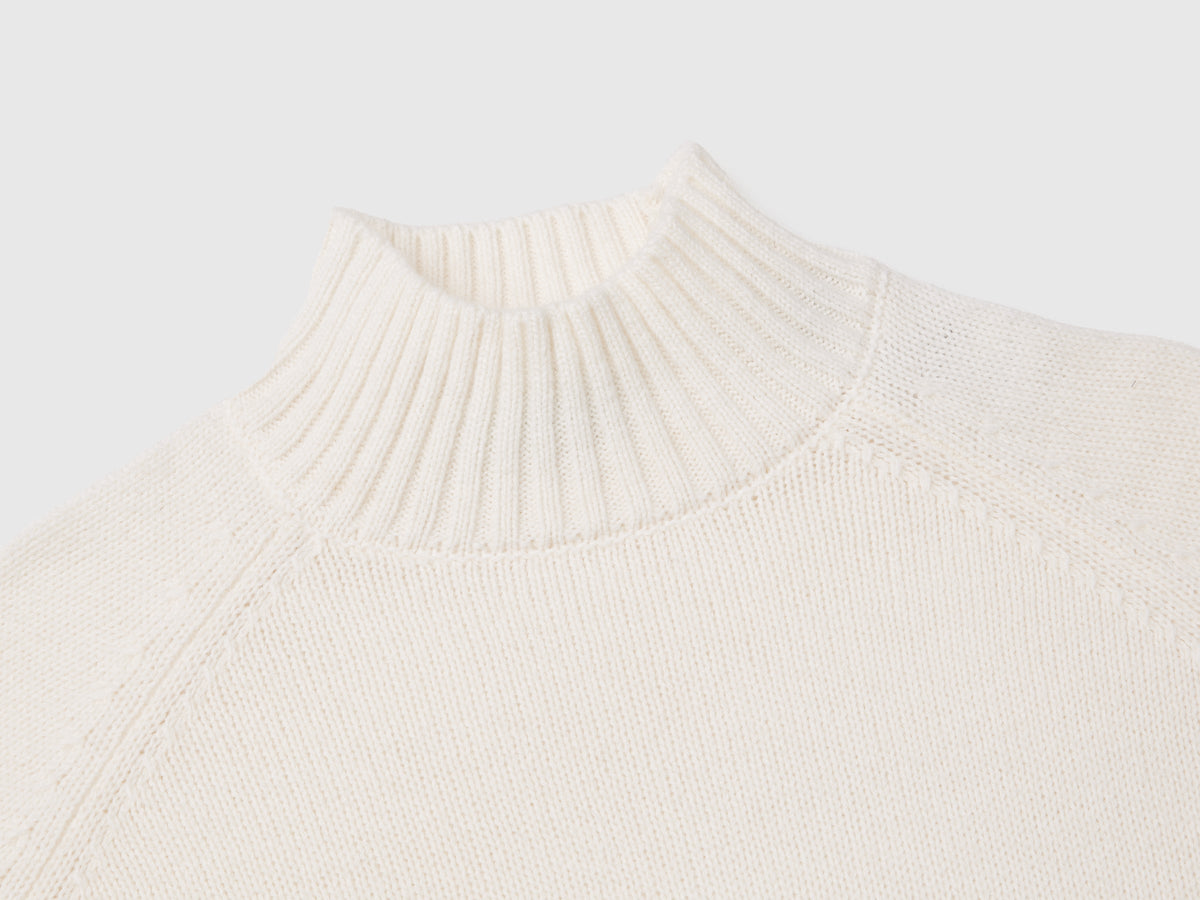 Maglione dolcevita over fit con frange