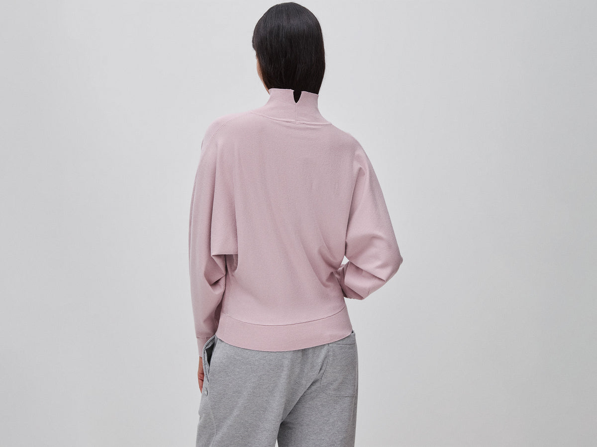 Maglia collo alto con manica a pipistrello