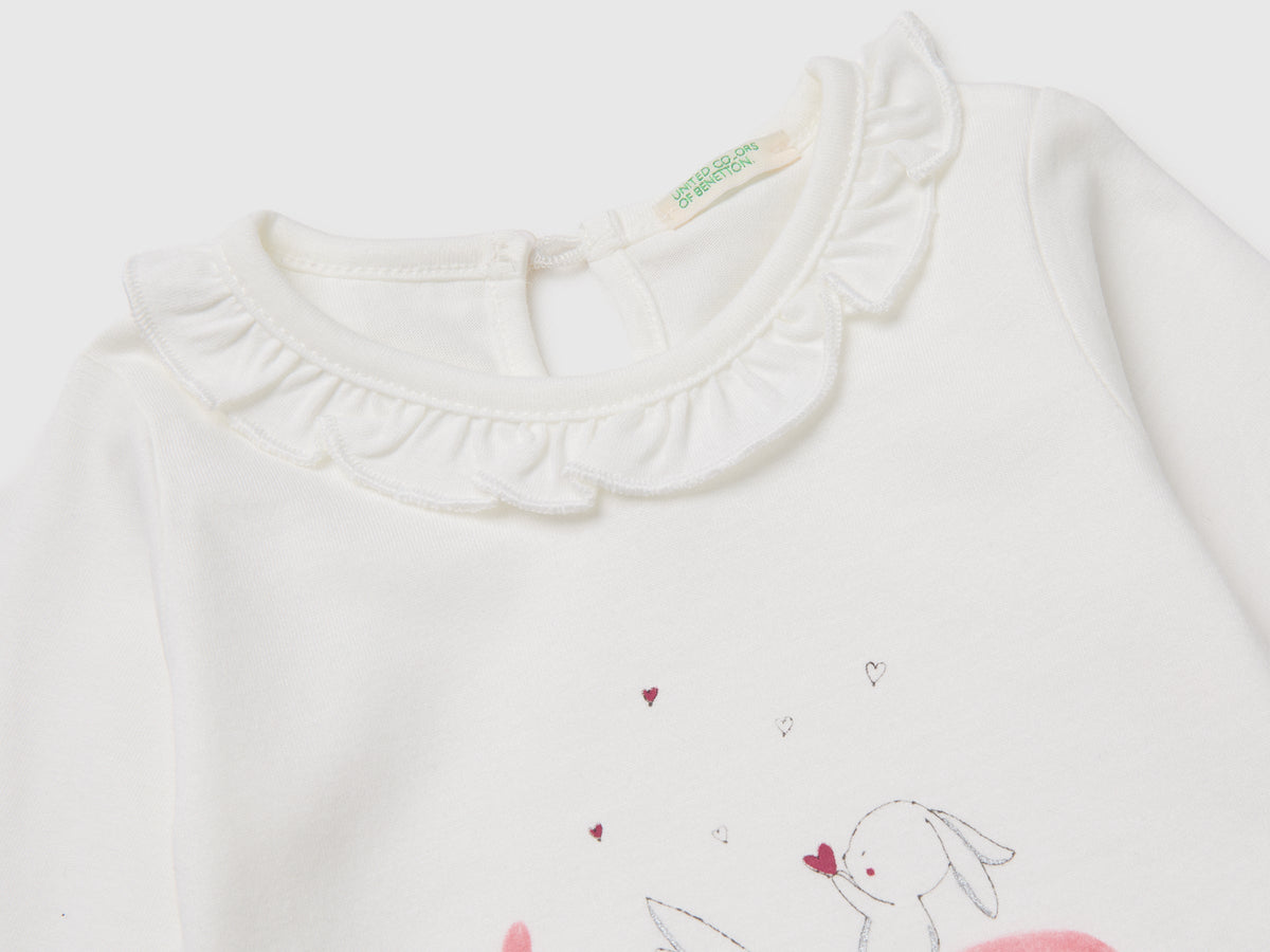 T-shirt con rouches sul collo
