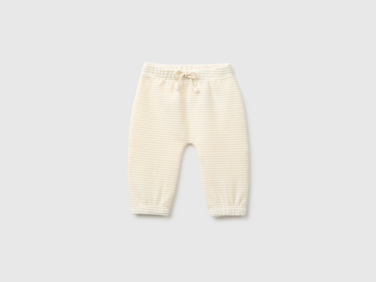 Pantaloni in ciniglia con ricamo dietro