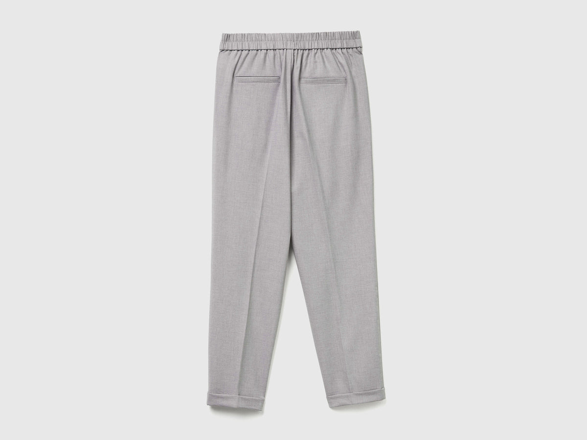Pantaloni con risvolto in misto viscosa stretch