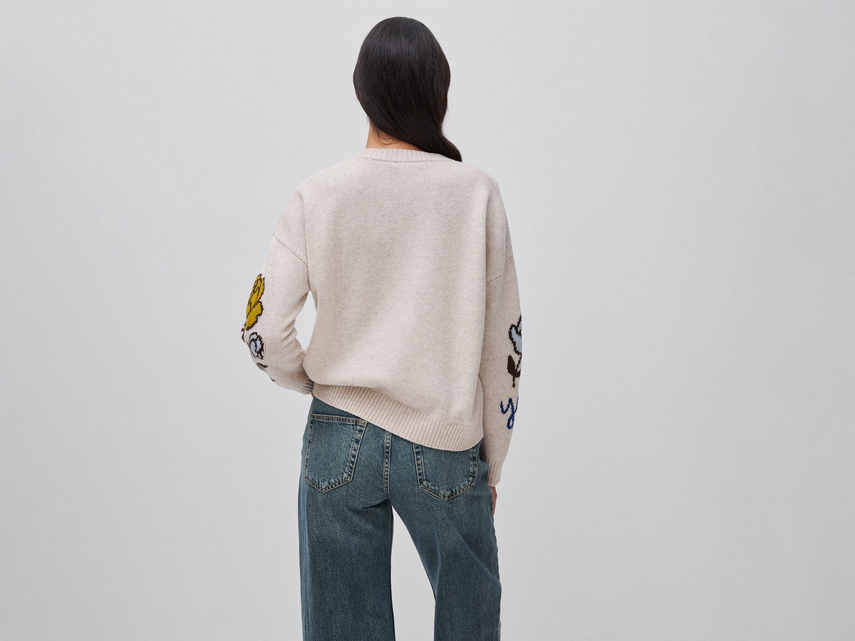 Maglia 100% lana con intarsio floreale
