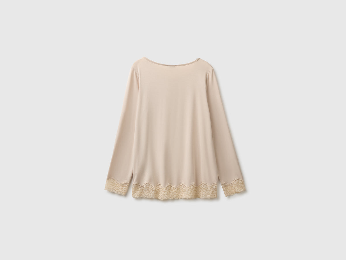 Maglia fluida con pizzo