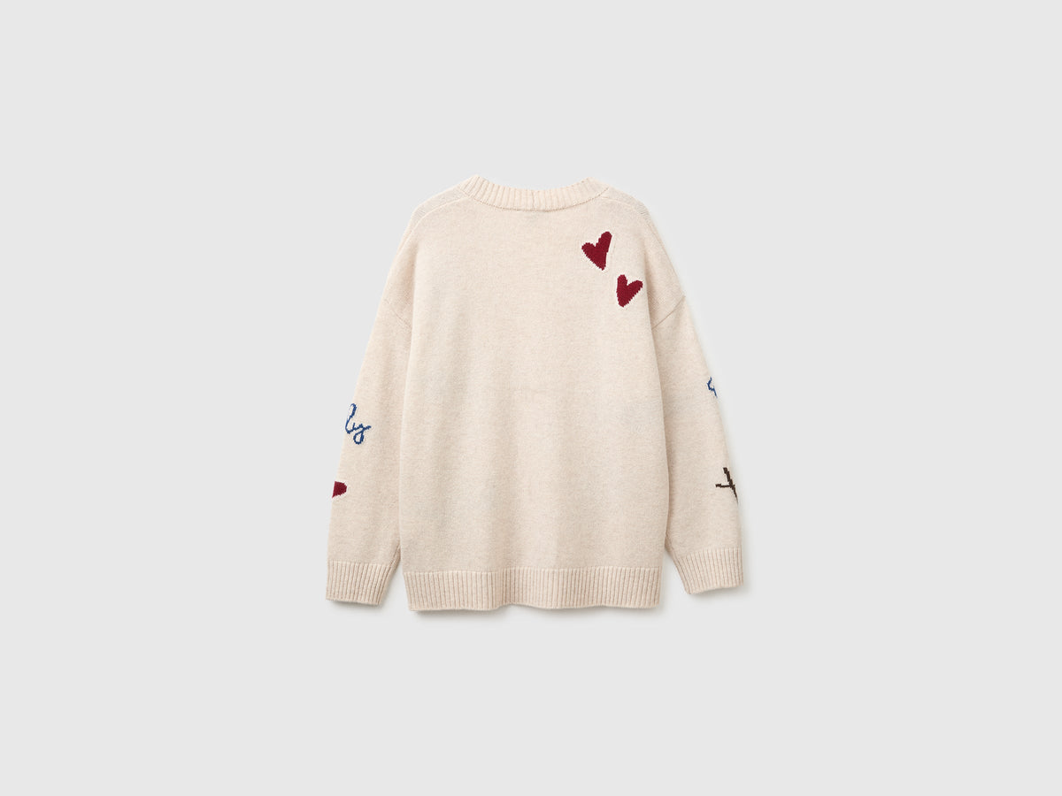 Cardigan 100% lana con intarsio floreale