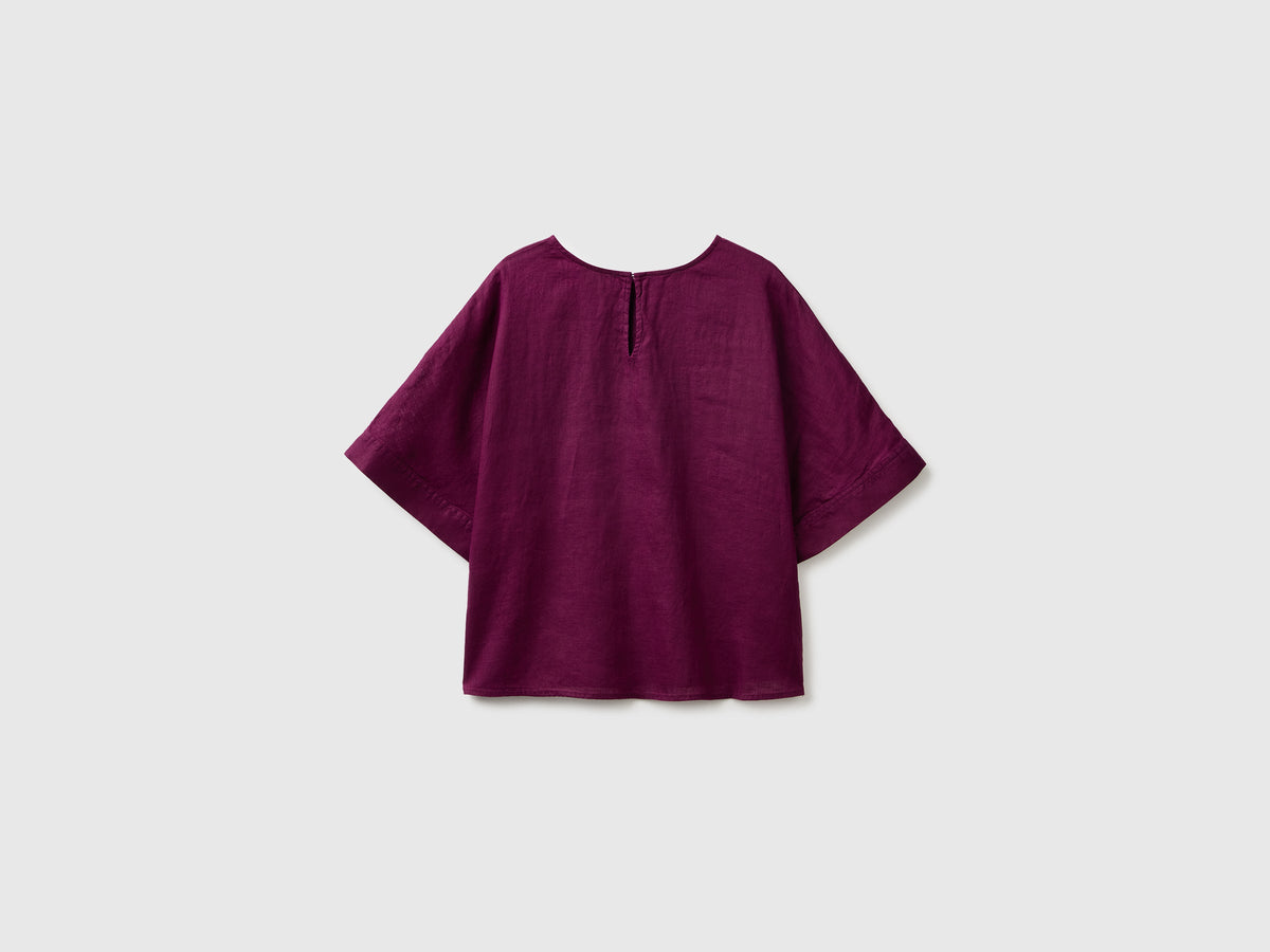 Blusa girocollo in puro lino