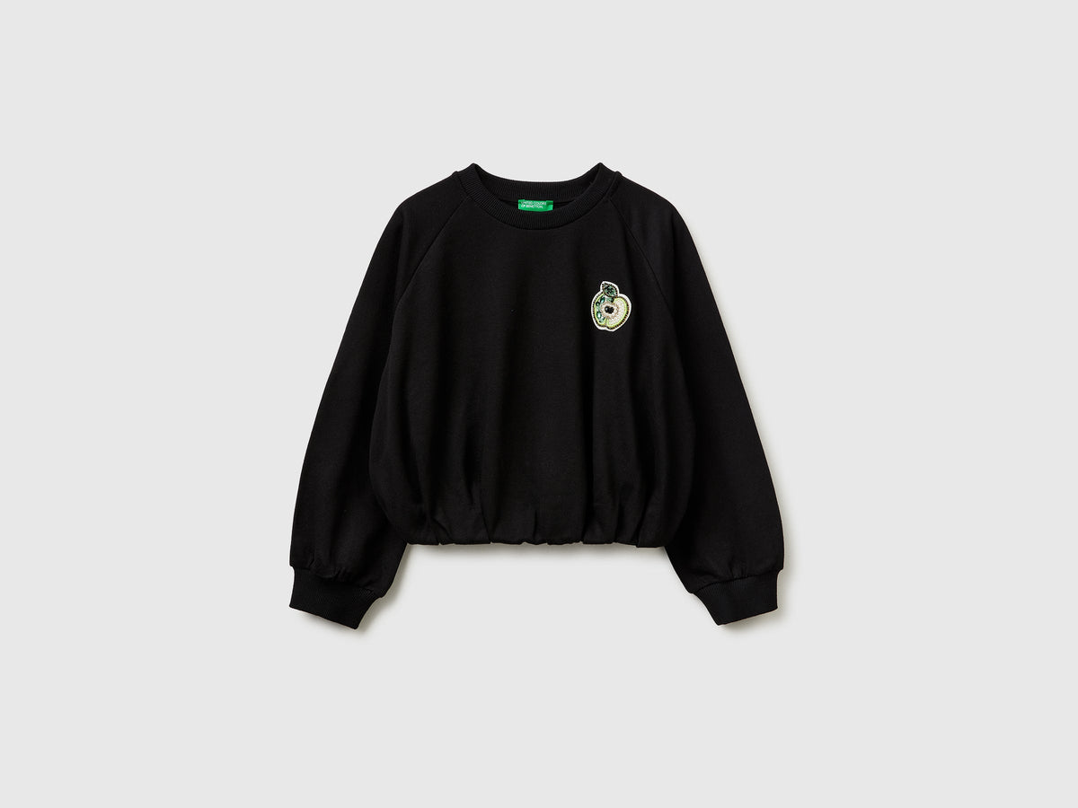 Felpa over con patch gioiello