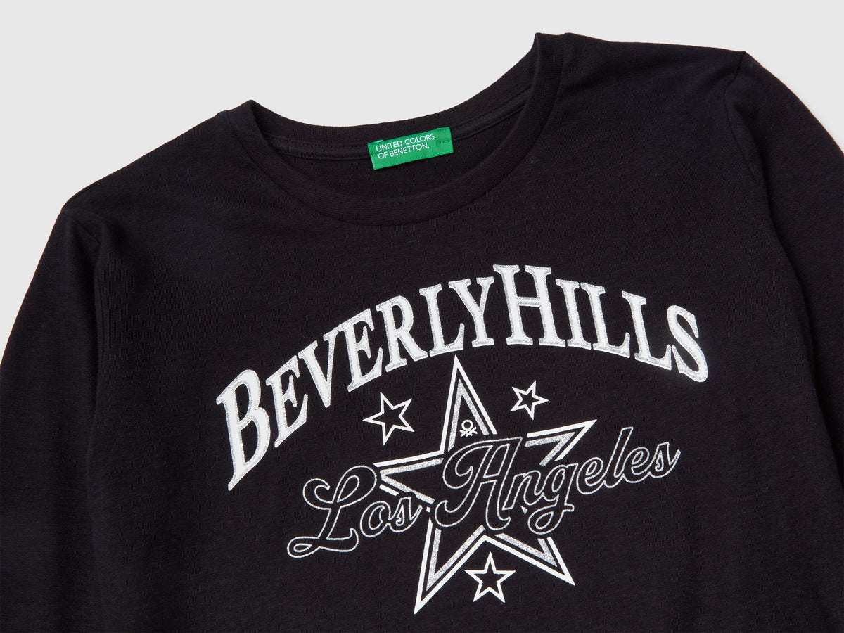 T-shirt con stampa glitter