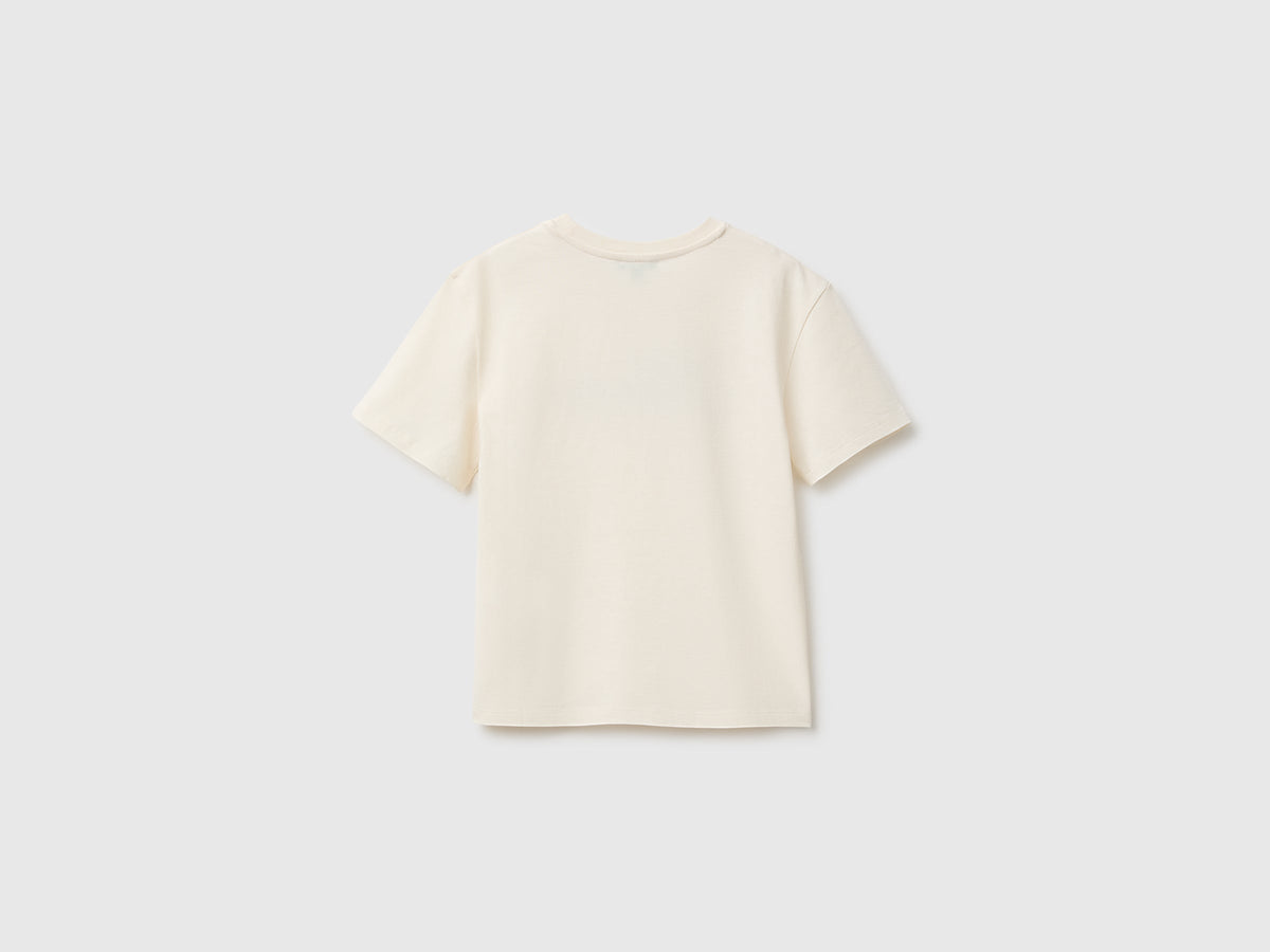 T-shirt con stampa glitter