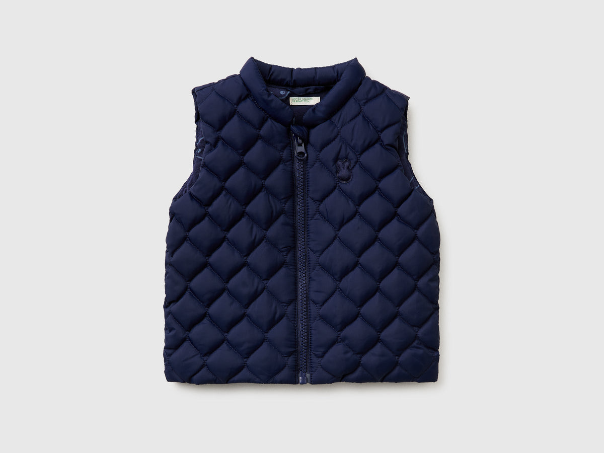 Piumino smanicato con zip