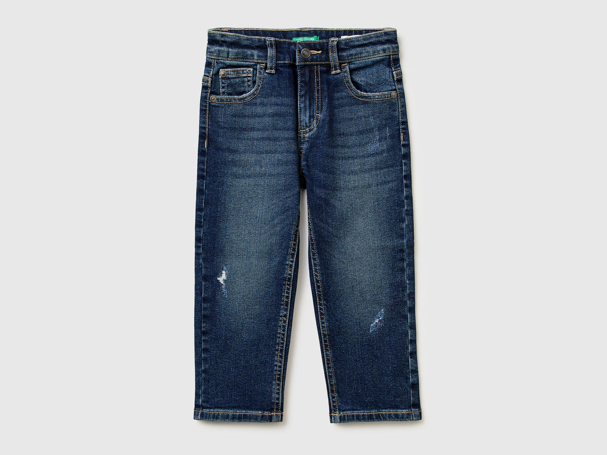 Jeans loose fit con rotture