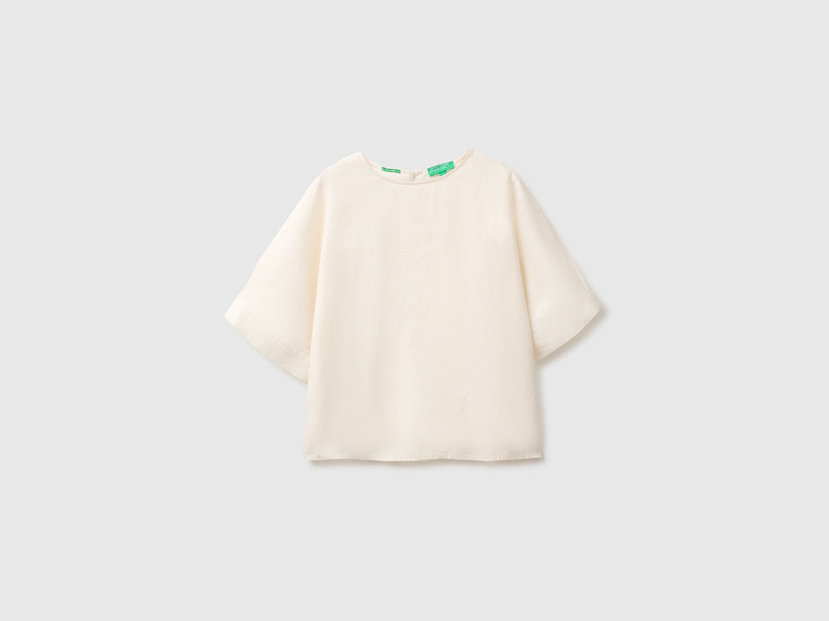Blusa girocollo in puro lino