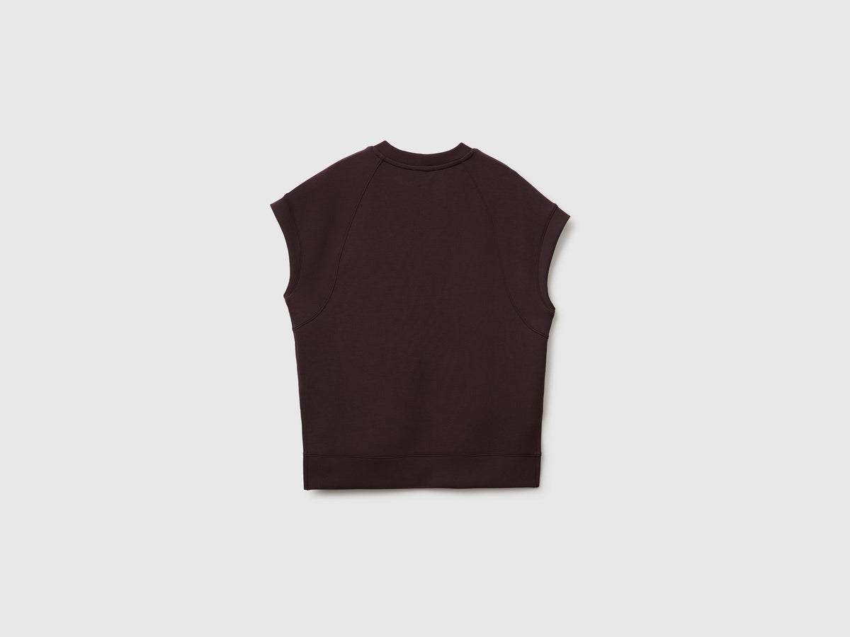 Top fluido con spacchi