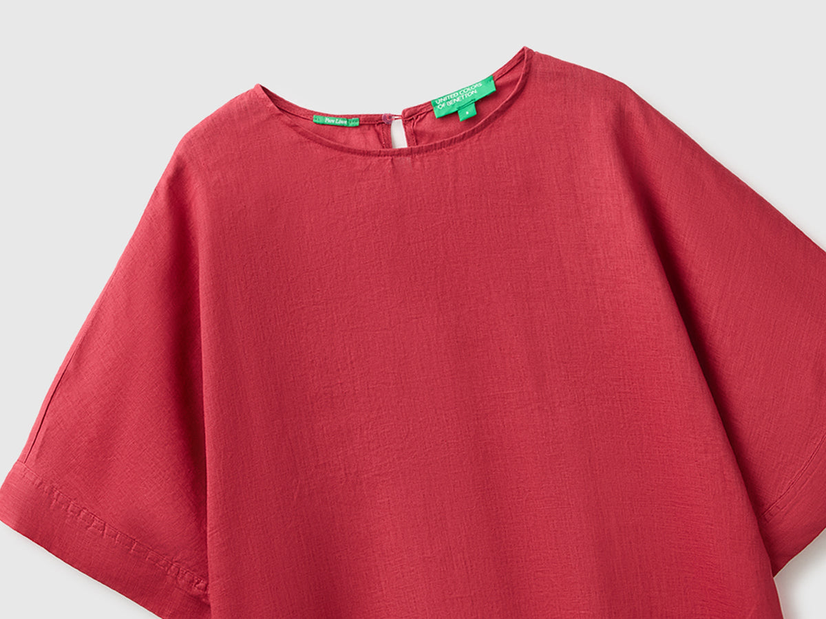 Blusa girocollo in puro lino