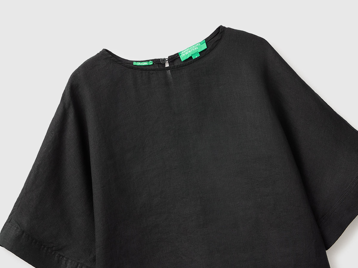 Blusa girocollo in puro lino