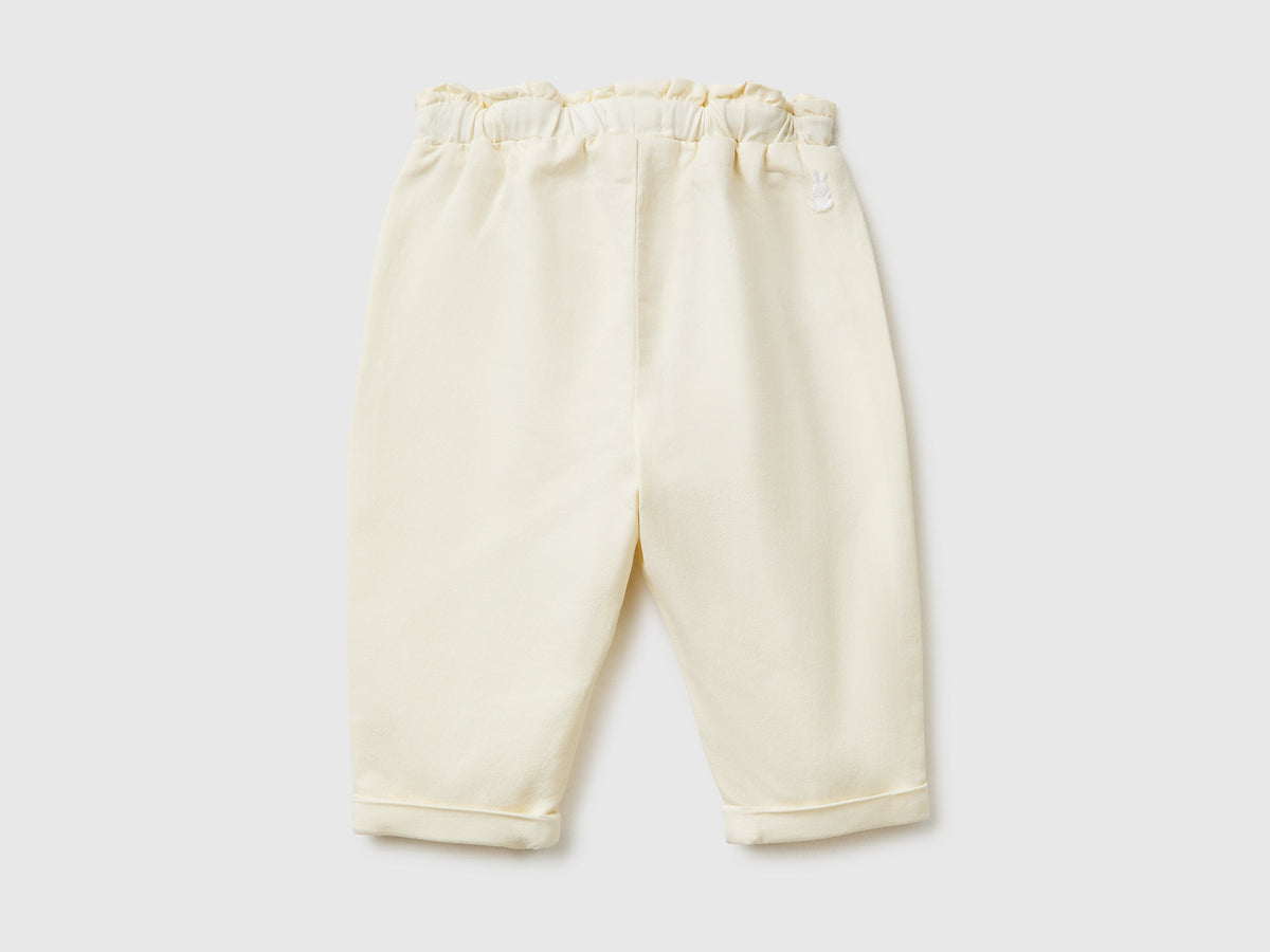 Pantaloni con mini rouches