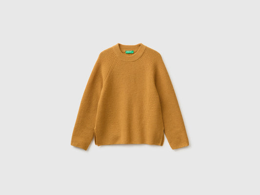 Maglia 100% lana con spacchetti sui fianchi