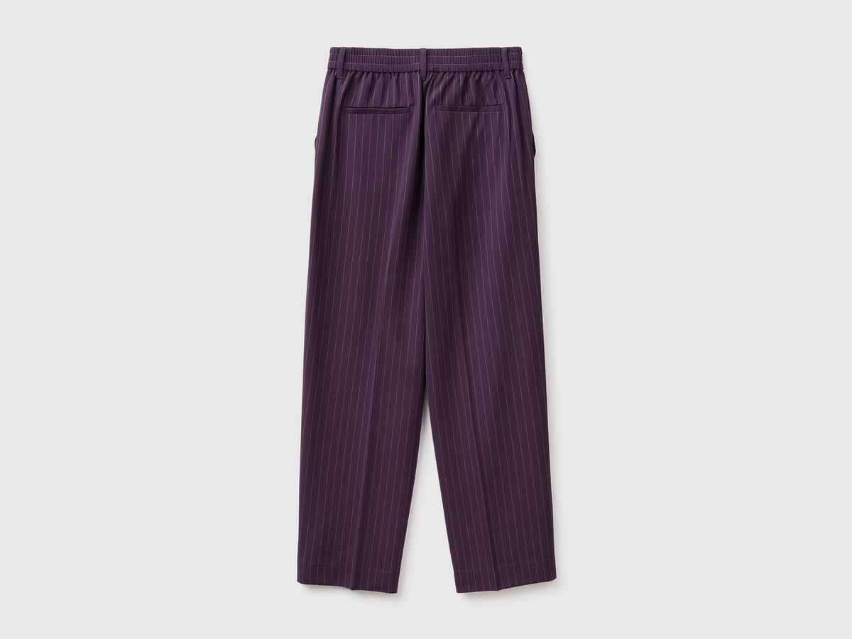 Pantaloni gessati carrot fit