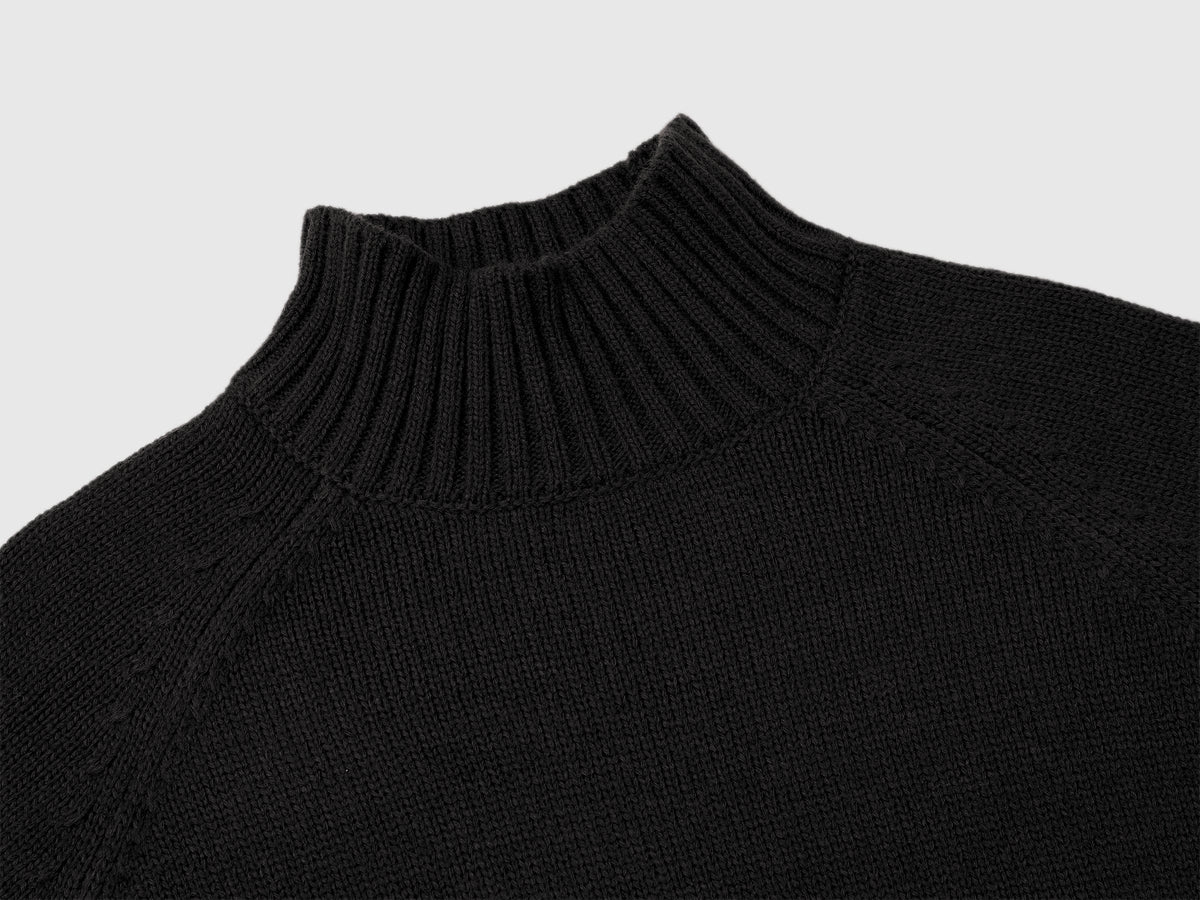 Maglione dolcevita over fit con frange
