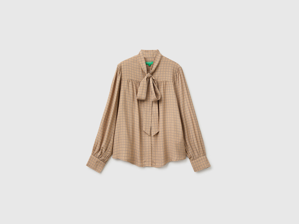 Blusa a quadretti vichy con fiocco