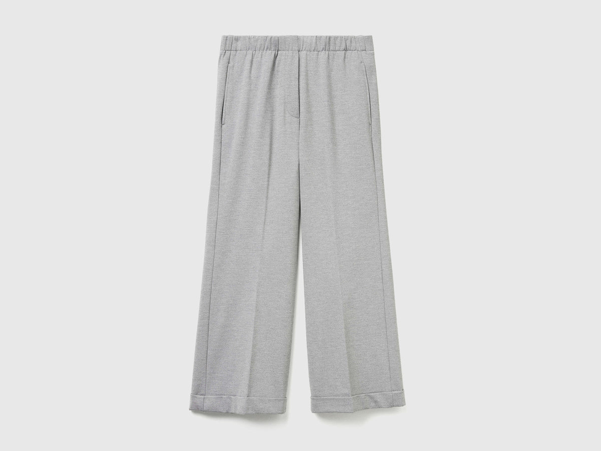 Pantaloni con elastico in vita e risvolto