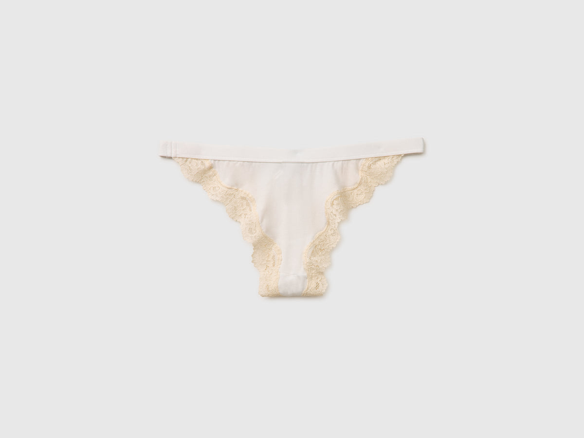 Slip basso in misto seta con pizzo