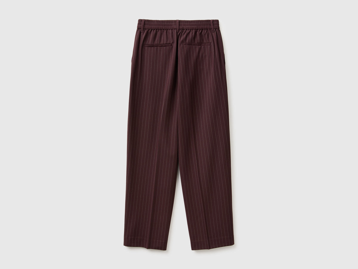 Pantaloni gessati carrot fit