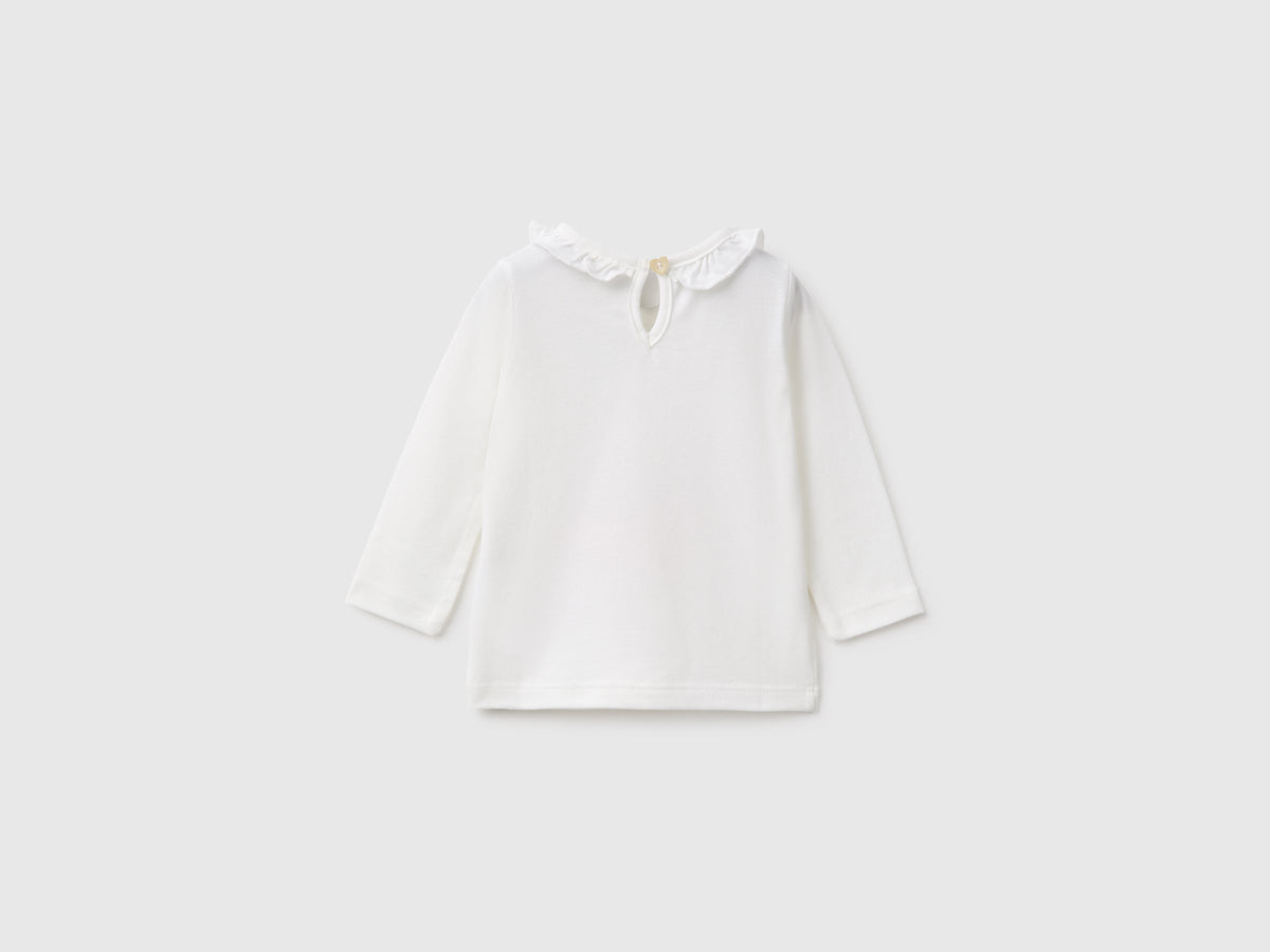 T-shirt con rouches sul collo