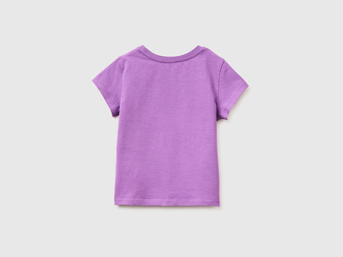 T-shirt con stampa glitter