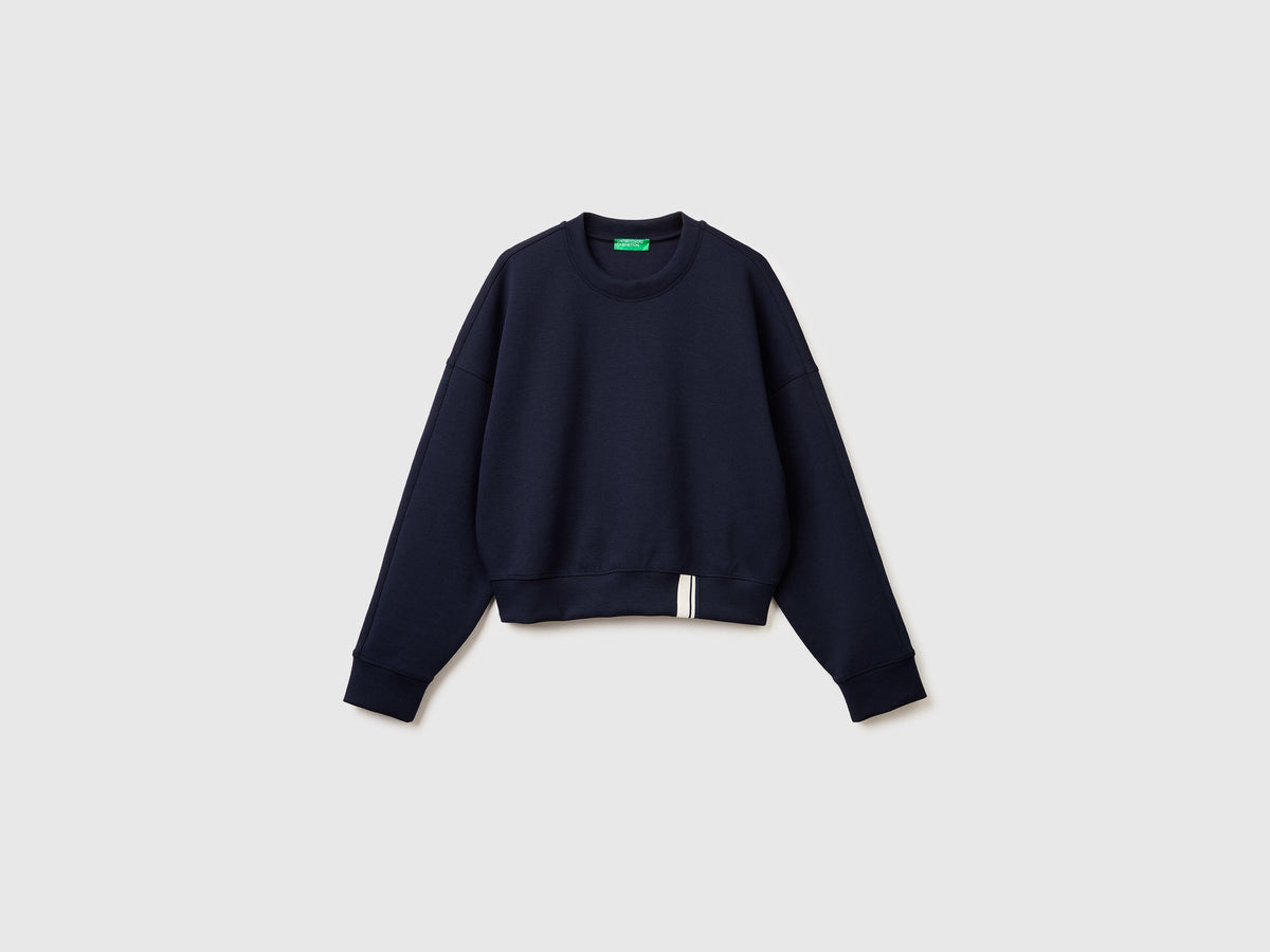 Felpa boxy fit con stemma dietro