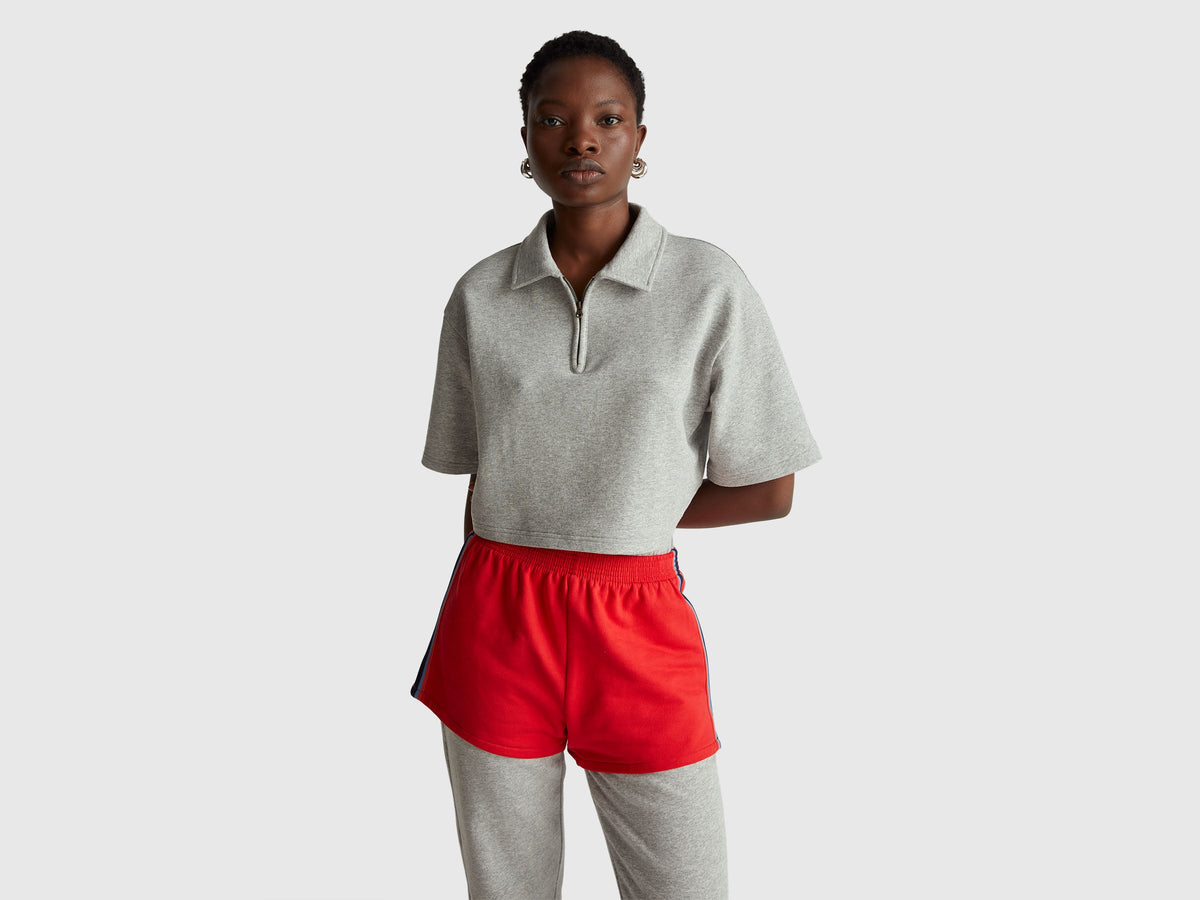 Polo cropped con zip Stranger Things