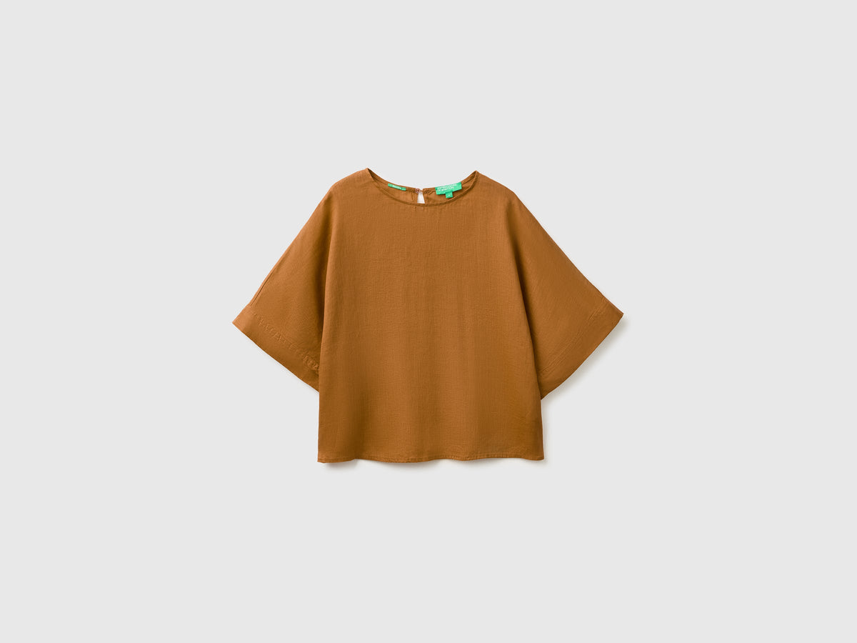 Blusa girocollo in puro lino