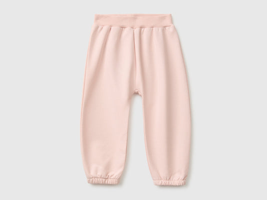 Pantaloni in felpa con animaletto sul retro