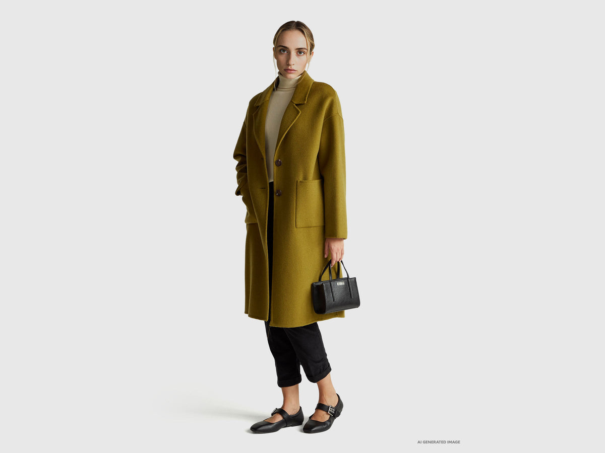 Maglione dolcevita panna in pura lana Merino