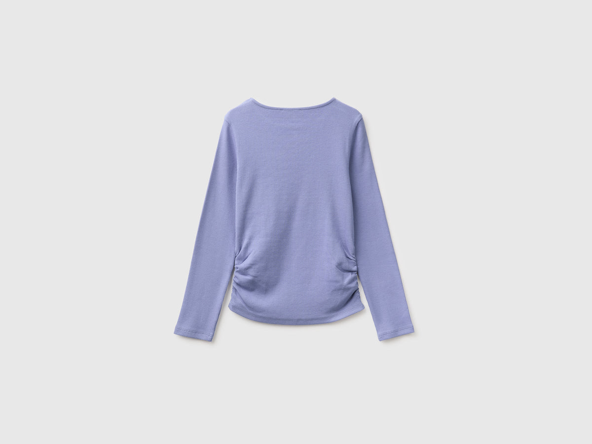 T-shirt con borchiette