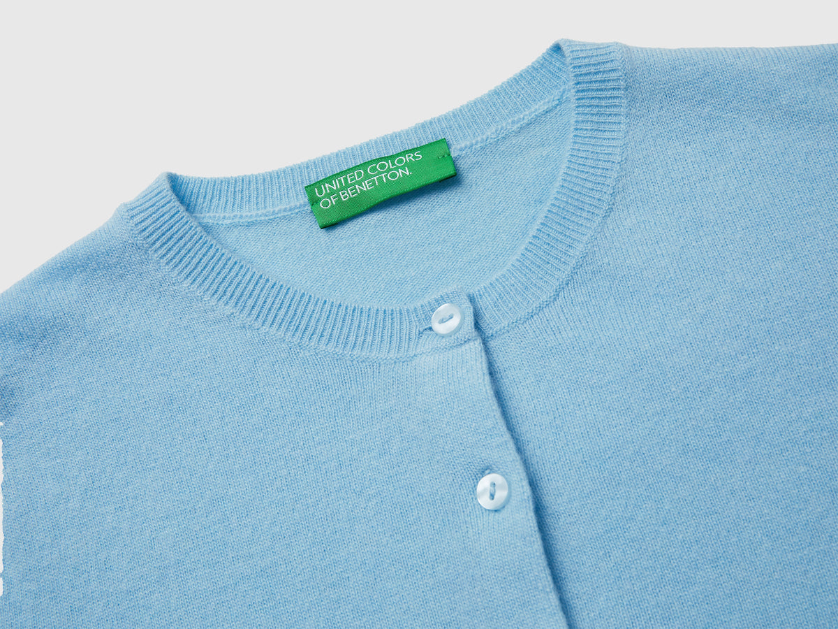 Cardigan girocollo celeste in pura lana Merino