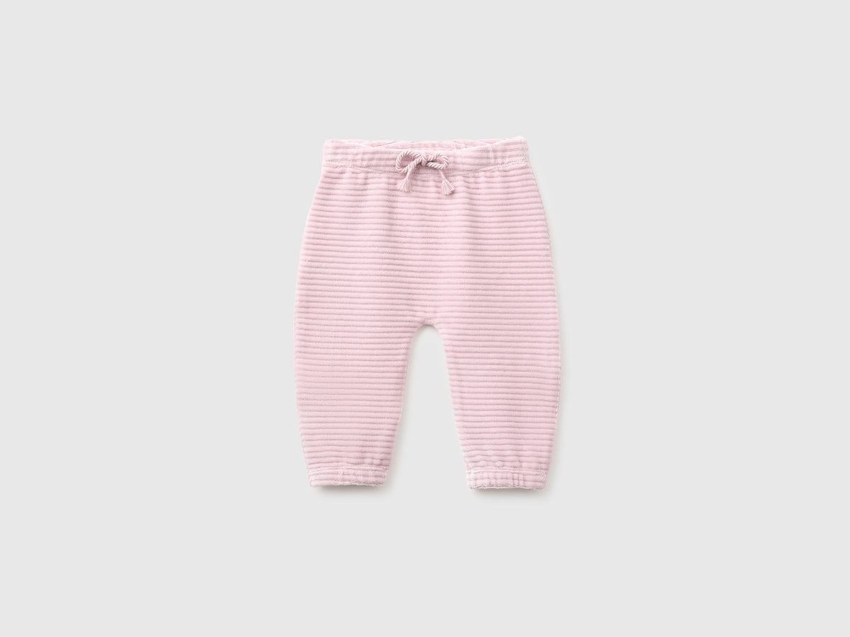Pantaloni in ciniglia con ricamo dietro