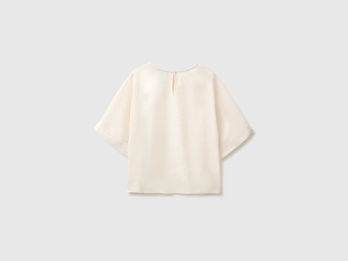 Blusa girocollo in puro lino