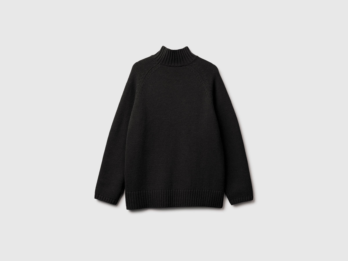 Maglione dolcevita over fit con frange