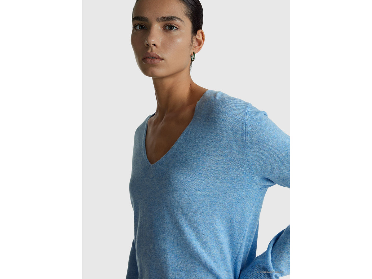 Maglione azzurro con scollo a V in pura lana Merino