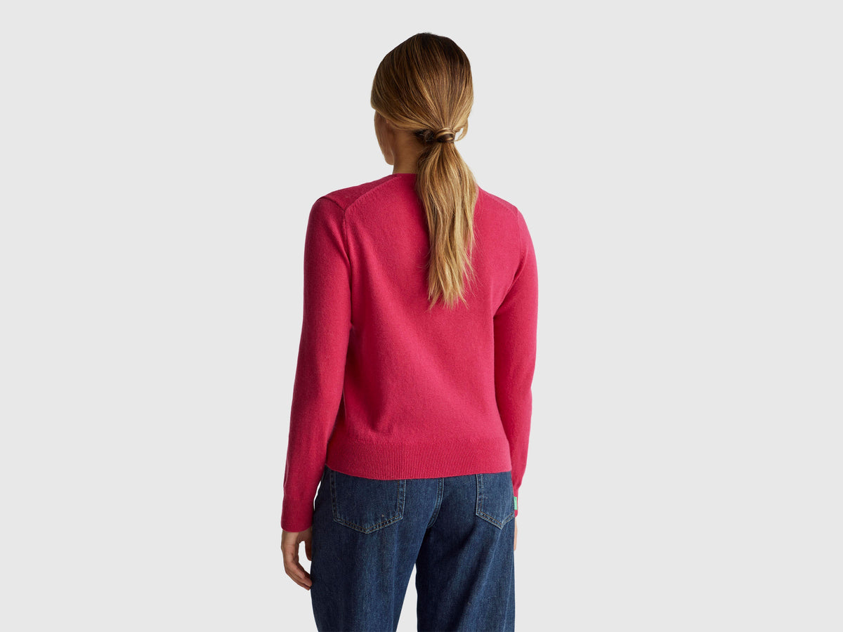 Maglione fucsia con scollo a V in pura lana Merino